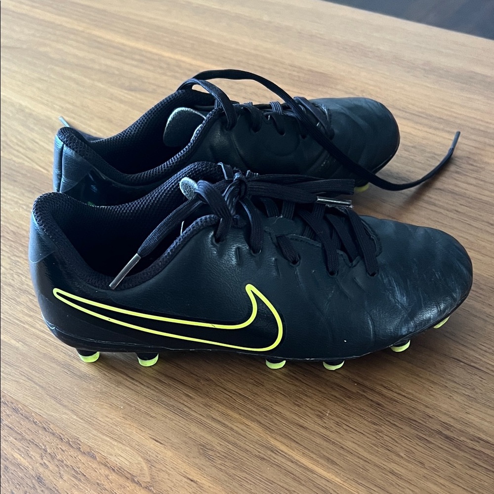 Nike Kids Black Soccer Cleats with Neon Yellow Swoosh